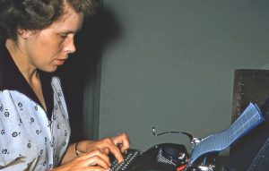 Della Dennis' Mother at a typewriter
