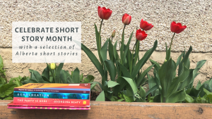 A stack of four Alberta-published books in front of blooming tulips in a flowerbed. Above the stack of books, text reads: "Celebrate Short Story Month with a Selection of Alberta Short Stories"